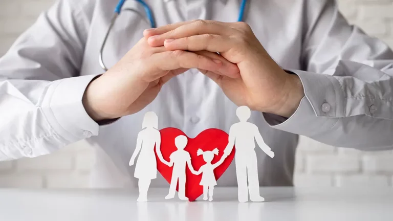 person holding hand and sheltering four people depicting healthcare technology