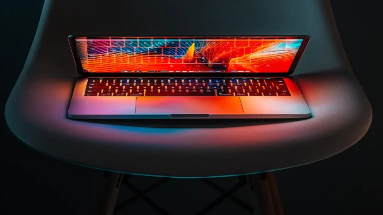 A switched on laptop screen in half open position