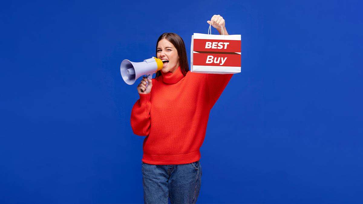 Lady holding a best buy open box and microphone